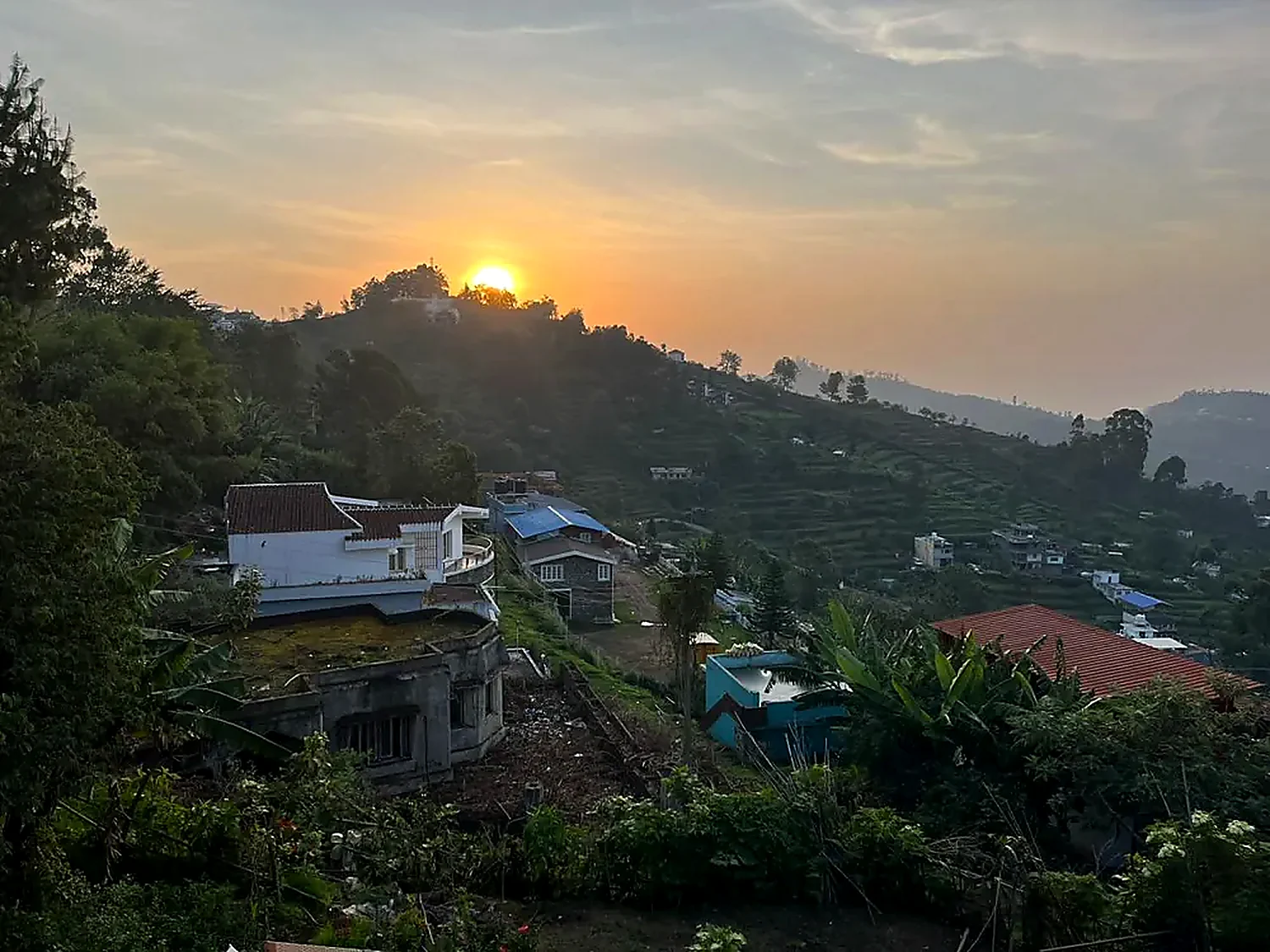Sunrise over a hill village near Kodaikanal